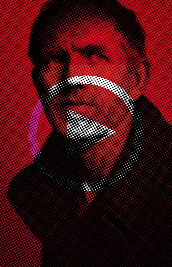 A man in a dark coat is shown with a serious expression against a red background, featuring a halftone dot effect and a large white play button symbol—perfect for highlighting your Guest Playlist in the Vertical Module.