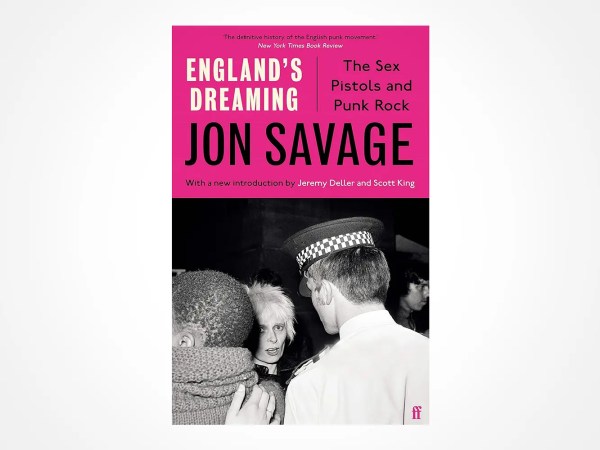 The book cover of England’s Dreaming: The Sex Pistols and Punk Rock by Jon Savage, featuring a black-and-white photo of punk fans and a police officer, with bold pink and black text.