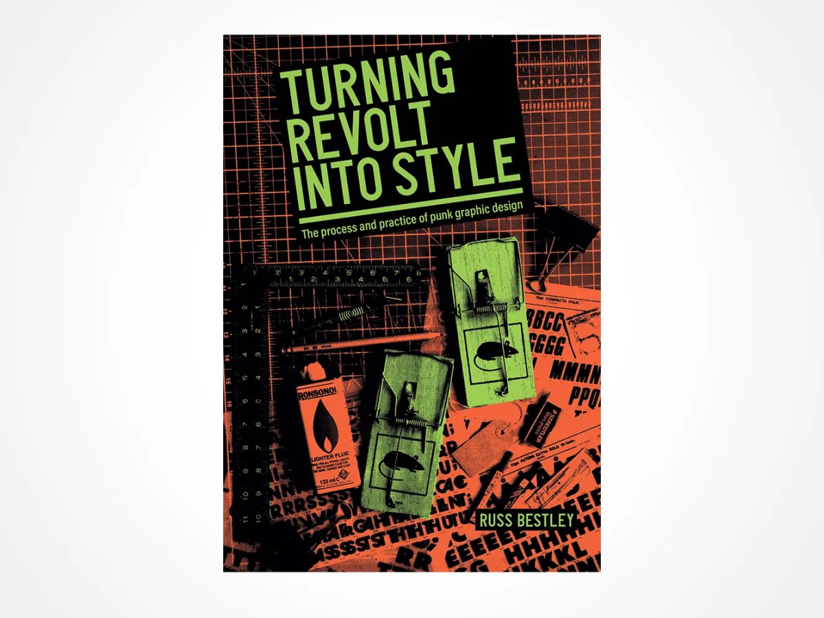 Book cover for Turning Revolt Into Style by Russ Bestley, featuring punk graphic design elements like neon green and orange colors, cutting mats, rulers, stencils, and two spray-painted mousetraps.